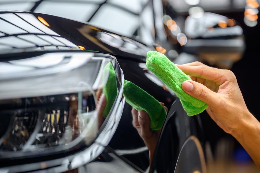 Applying ceramic coating to a glossy black vehicle by hand